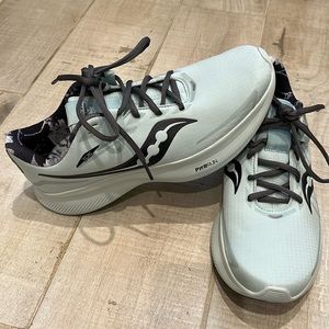Seafoam colored Saucony running shoes